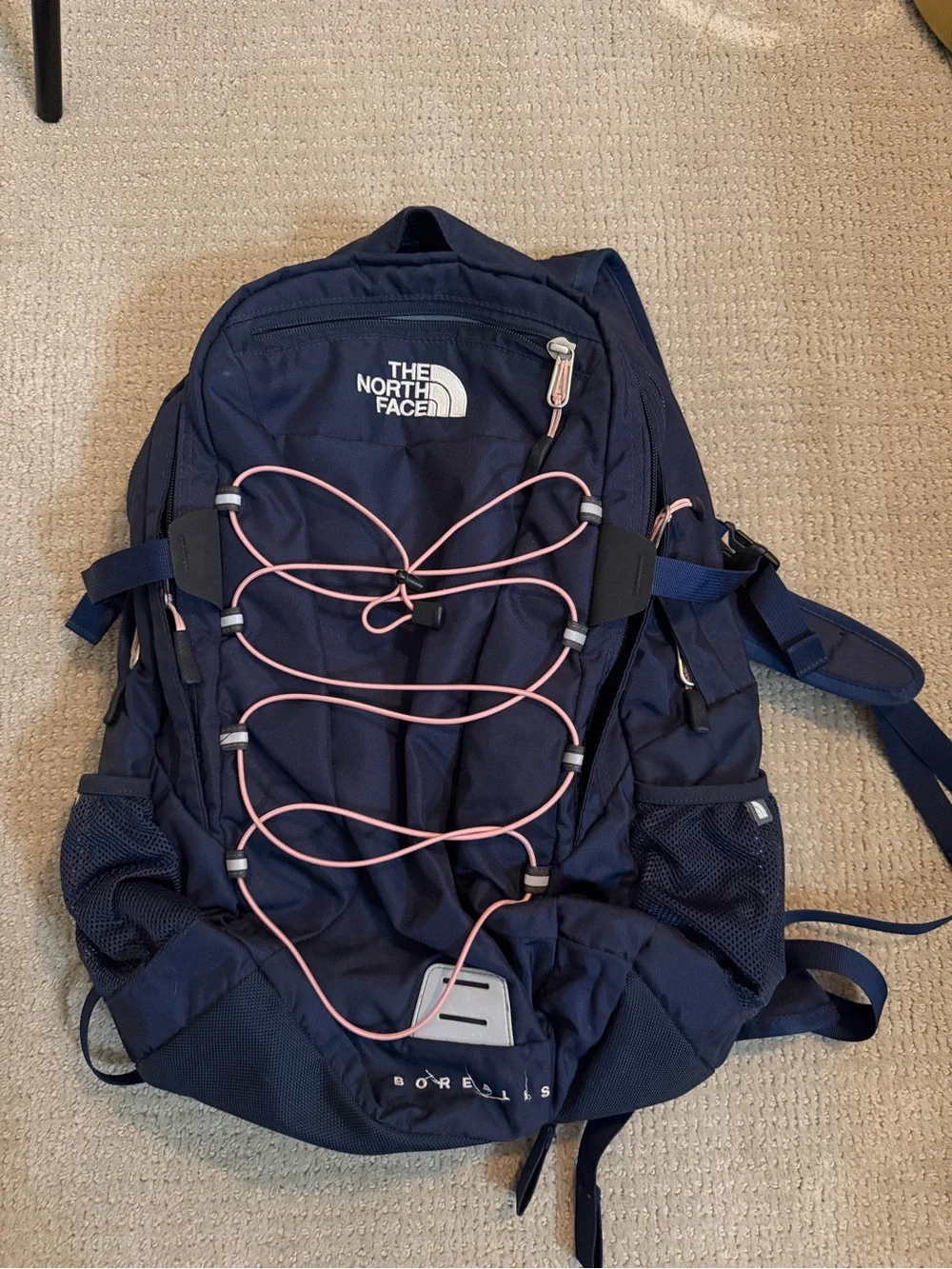The North Face Navy Backpack with Pink Bungee Cord